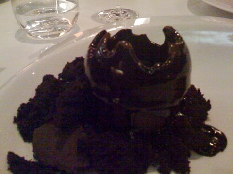 don't be too proud of this chocolate terror you've constructed... oh, hell, be proud a side view of the jagged edges of the chocolate sphere
